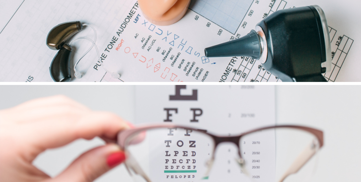 Audiology tools and eye glasses on an eye chart